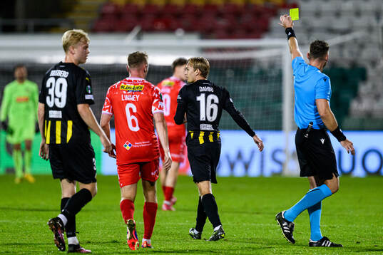 Pontus Dahbo of Häcken receives a yellow card