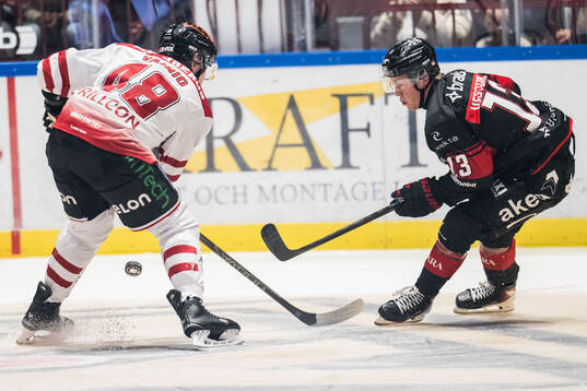 Örebros Juuso Vainio och Malmö Redhawks Petter Vesterheim
