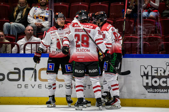 Örebros David Quenneville och Patrik Karlkvist jublar