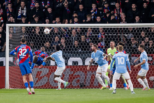 Rafiu Durosinmi of Viktoria Plzen and Emmanuel Ekong of