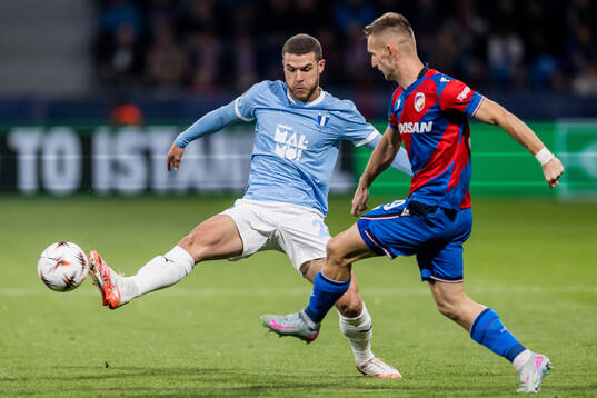 Gabriel Busanello of Malmö FF and Amar Memic of Viktoria