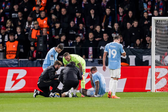 Pontus Jansson of Malmö FF receives medical attention