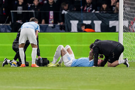 Pontus Jansson of Malmö FF receives medical attention