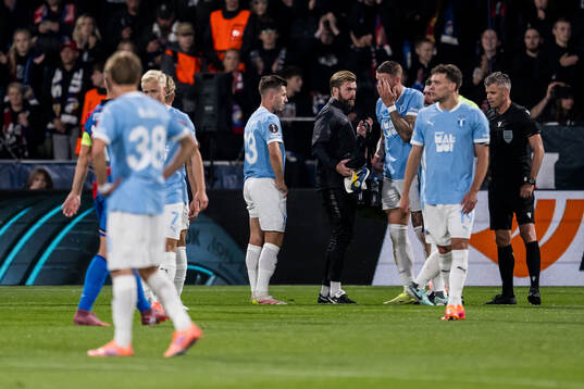 Pontus Jansson of Malmö FF receives medical attention
