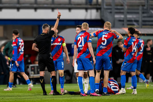 Referee Enea Jorgji calls a red card and Lasse Berg Johnsen