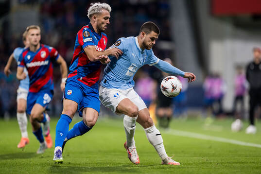 Tomas Ladra of Viktoria Plzen and Gabriel Busanello of
