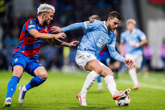Tomas Ladra of Viktoria Plzen and Gabriel Busanello of