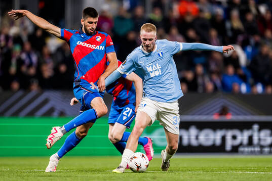 Adrian Zeljkovic of Viktoria Plzen and Daniel Gudjohnsen of