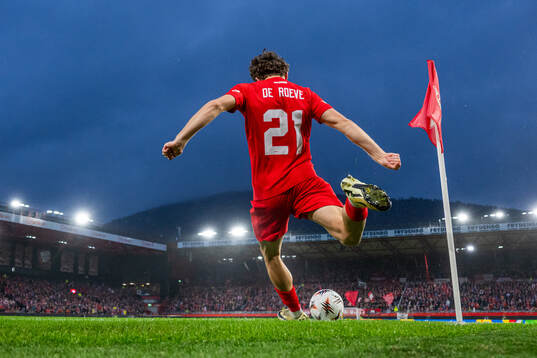 Denzel De Roeve of Brann takes a corner kick