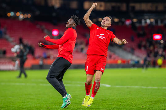 Nana Kwame Boakye and Niklas Castro of Brann celebrate