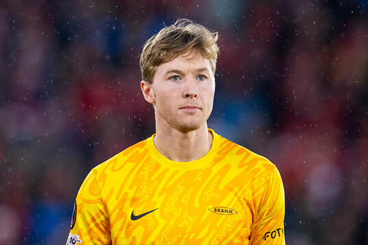 Goalkeeper Mathias Dyngeland of Brann line up