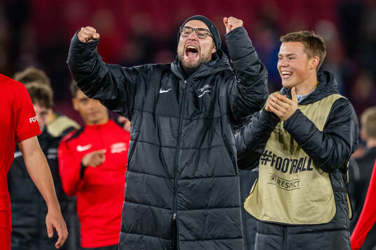 Assistant coach Jonathan Hartmann of Brann celebrates