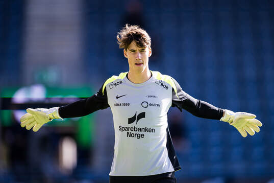Goalkeeper Tom Johannes Aloysius Bramel of Brann warms up