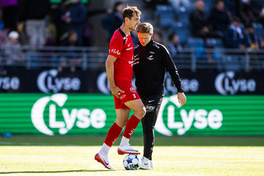 Fredrik Pallesen Knudsen of Brann with an injury