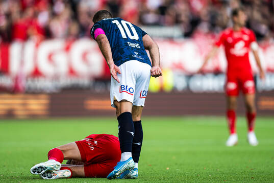 Emil Kornvig of Brann and Zlatko Tripic of Viking