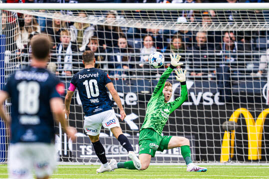 Zlatko Tripic of Viking and goalkeeper Mathias Dyngeland of