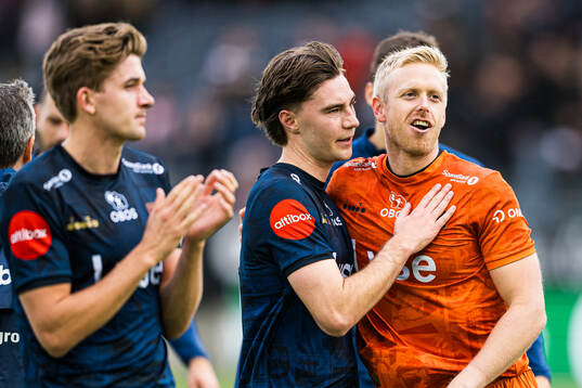 Simen Kvia-Egeskog and goalkeeper Arild Østbø of Viking