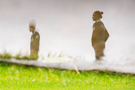 The reflection from a water puddle of Thelo Aasgaard of the