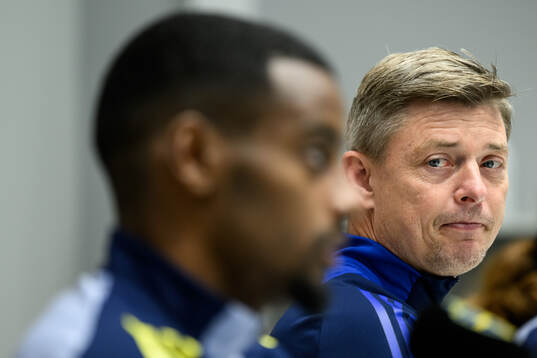 Alexander Isak and Head coach Jon Dahl Tomasson of the