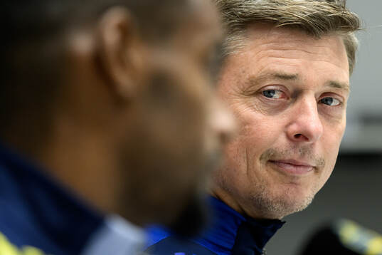 Alexander Isak and Head coach Jon Dahl Tomasson of the