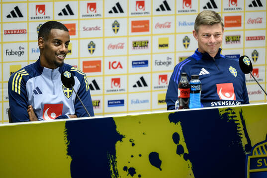 Alexander Isak and Head coach Jon Dahl Tomasson of the