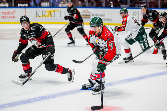 Malmö Redhawks Topi Niemelä och Frölundas Henrik