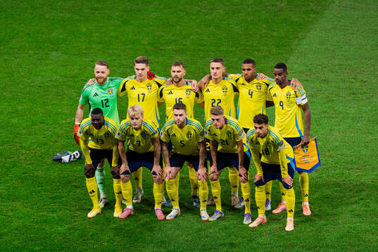 The starting eleven of Sweden pose for a team photo
