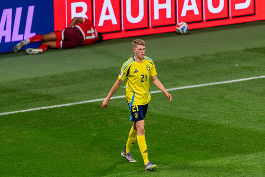 Dan Ndoye of Switzerland and Alexander Bernhardsson of