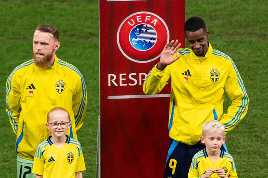 Goalkeeper Viktor Johansson and Alexander Isak of Sweden