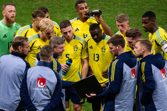 Head coach Jon Dahl Tomasson of Sweden with Lucas Bergvall,