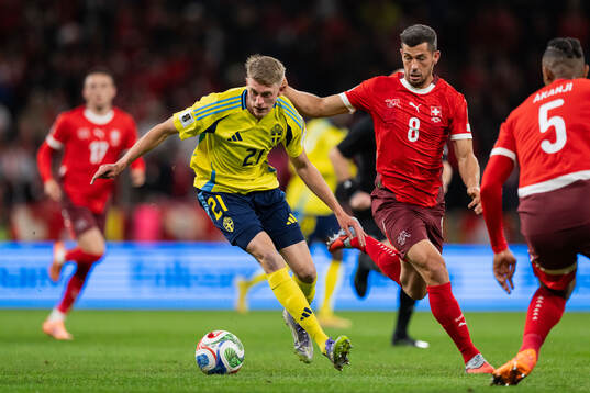 Alexander Bernhardsson of Sweden and Remo Freuler of