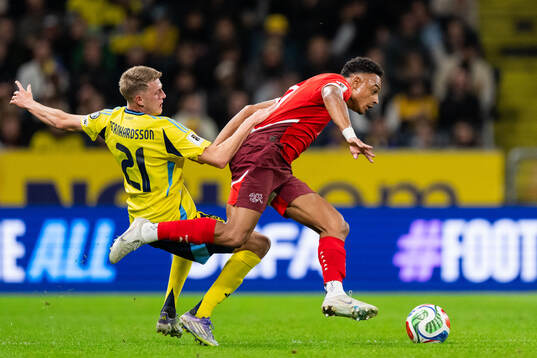 Alexander Bernhardsson of Switzerland and Breel Embolo of