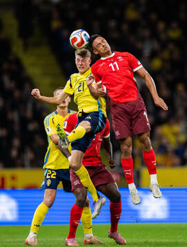 Alexander Bernhardsson of Sweden and Dan Ndoye of