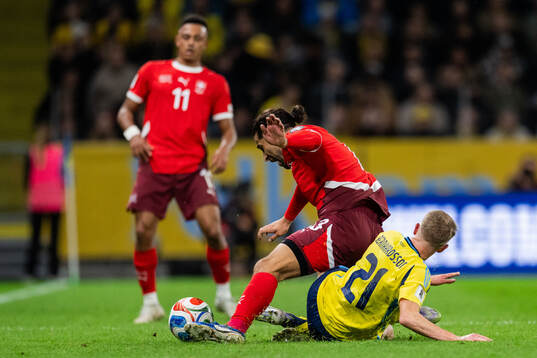 Ricardo Rodriguez of Switzerland and Alexander Bernhardsson