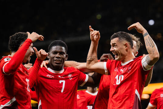 Ruben Vargas, Breel Embolo, and Granit Xhaka of Switzerland