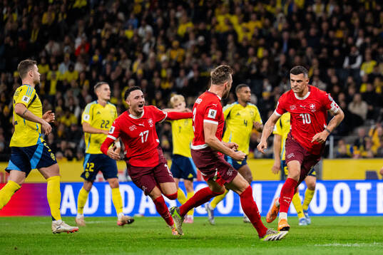 Ruben Vargas, Silvan Widmer, and Granit Xhaka of