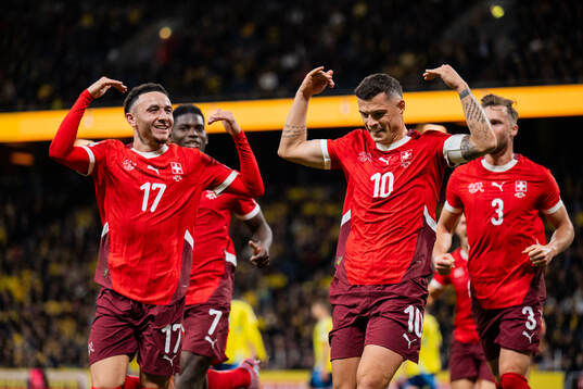 Ruben Vargas and Granit Xhaka celebrating the 0-1 goal