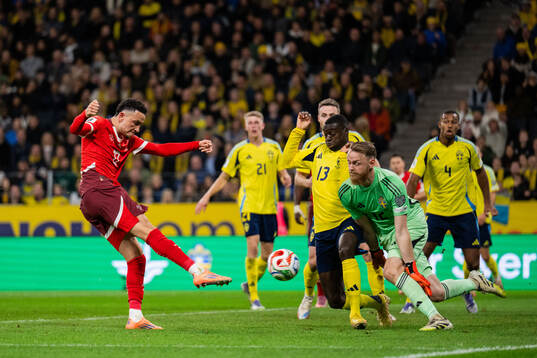 Ruben Vargas of Switzerland against Ken Sema and goalkeeper