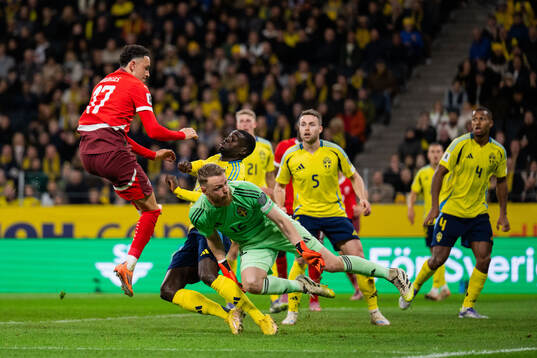 Ruben Vargas of Switzerland against Ken Sema and goalkeeper