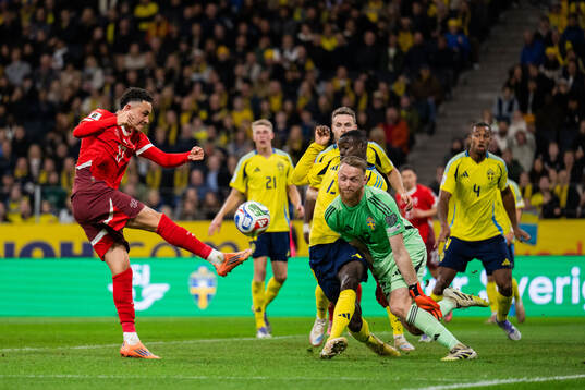 Ruben Vargas of Switzerland against Ken Sema and goalkeeper
