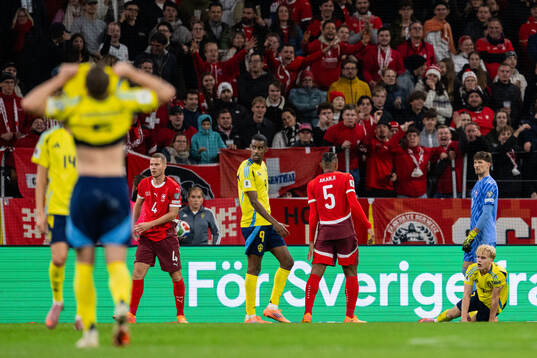 Alexander Isak and Lucas Bergvall of Sweden looks dejected