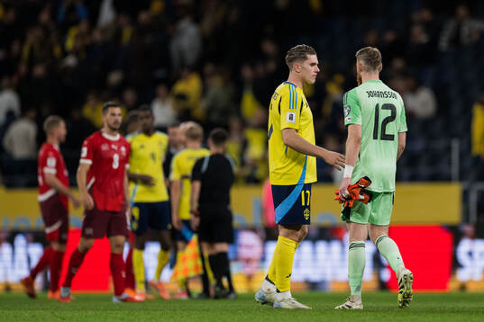 Viktor Gyökeres and goalkeeper Viktor Johansson of Sweden