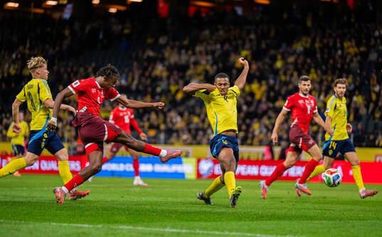Johan Manzamb of Switzerland scores the 0-2 goal against