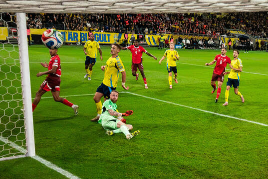 Johan Manzambi of Switzerland scores 0-2 behind goalkeeper