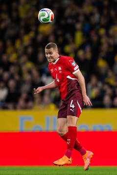 Nico Elvedi of Switzerland