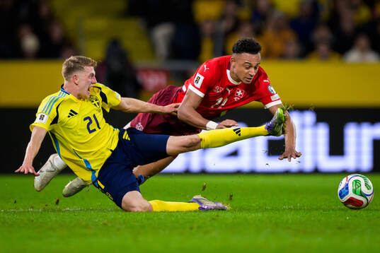 Alexander Bernhardsson of Sweden and Dan Ndoye of
