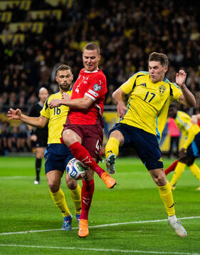 Nico Elvedi of Switzerland, Jesper Karlström and Viktor