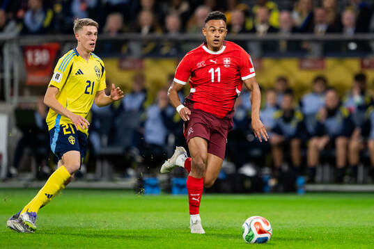 Alexander Bernhardsson of Sweden and Dan Ndoye of