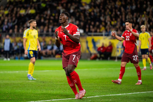 Breel Embolo of Switzerland looks dejected