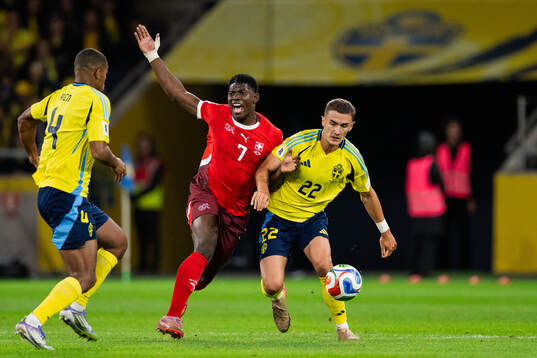 Breel Embolo of Switzerland and Gustaf Lagerbielke of Sweden